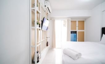 New Studio Apartment with Strategic Location at Suncity Residence By Travelio