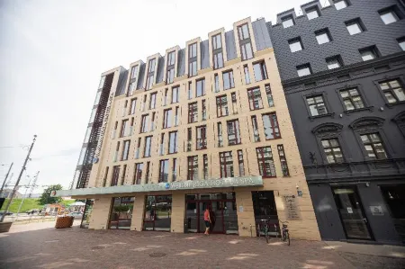 Wellton Riga Hotel & Spa Отели рядом с достопримечательностью «Латвийская академия наук (LZA)»