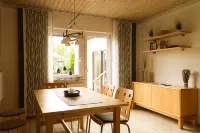 Apartment with terrace and garden right by the natural outdoor pool Hotels in Muggensturm