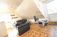 Tobi's Kajüte Freundliche Obergeschosswohnung in Norddeich für 4 Personen + Baby