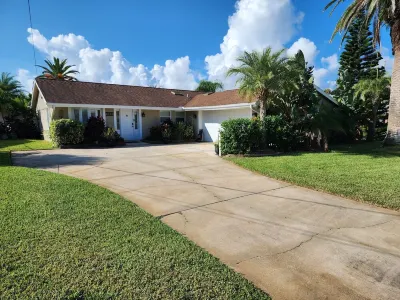 Intercostal Channel House with Boat Dock and Ping-Pong Table Hotels near PEGCO, Inc.