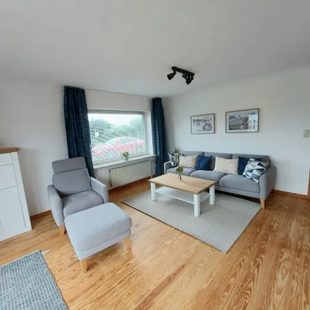 Gemütliche Erdgeschosswohnung mit Terrasse Отели в г. Вестердайхштрих