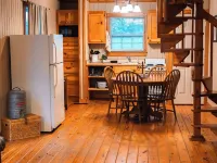 Charming 2-bedroom cottage with loft, AC, and WiFi on peaceful 295-acre property Hotels in Conway County