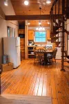 Charming 2-bedroom cottage with loft, AC, and WiFi on peaceful 295-acre property