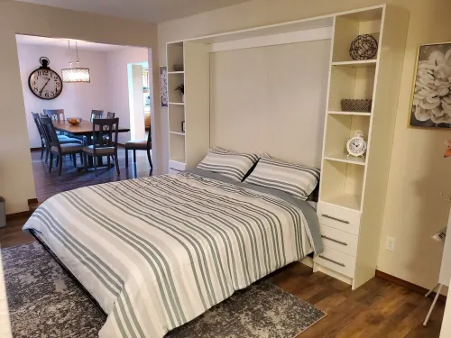 Lakefront Getaway. Private Waterfront Home with Dock and Sunroom.