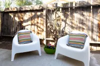 Spin Some Vinyl at a Lush Green Retreat with Two Bedrooms