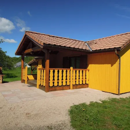 Fenced cottage rental with barbecue and children's play area