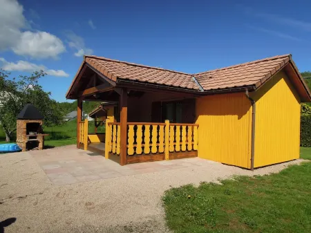 Fenced cottage rental with barbecue and children's play area