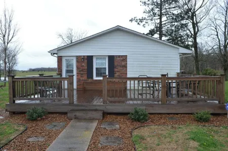 Country Setting with Mature Trees, Large Deck. Game/Rec Room, Fire Pit and Grill