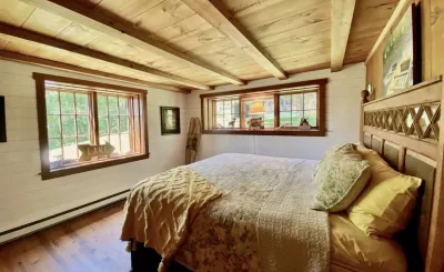 Lakefront luxury, Lake George log cabin home with your own private sandy beach