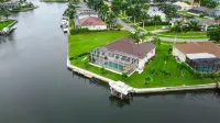 Waterfront Paradise Home With Over-Sized Pool, Dock, And Boating Access