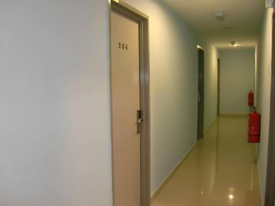 Corridor Jasmine Inn Hotel Photo