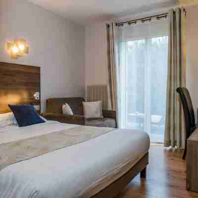 Hôtel Le Petit Casset Rooms