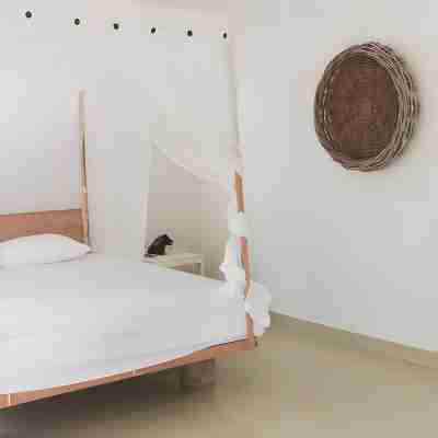 The Village Inn Rua Beach Rooms