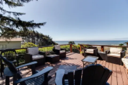 Large beach home with fantastic views of the Oregon Coast with a quaint cabin.