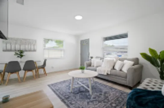 Stylish Duplex with Fenced Backyard and BBQ Grill - Tranquil Escape