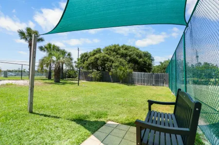 Swimming Pool and Fitness Center - Stylish Coastal Retreat