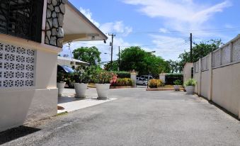 Welcome to the Unpretentious and Breezy Graceville, Steps Away from the Beach