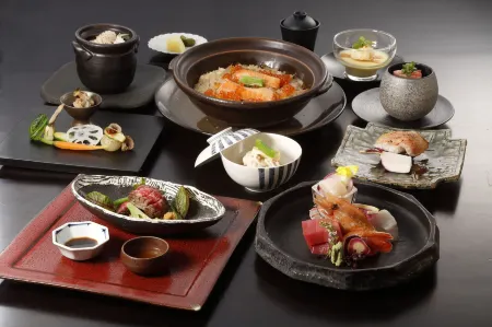 Niseko Konbu Onsen Tsuruga Moku-No-Sho Отели рядом с достопримечательностью «Niseko Sahina campsite»