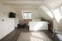 De with Studio's Hotel a 