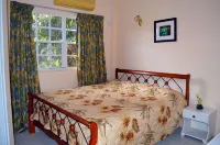 Beachcross Villa Apartments Отели в г. 