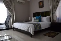 Triple Palms Bed and Breakfast Hotels in Копонг