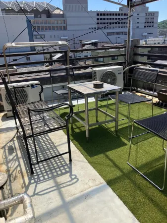 A Nostalgic and Tasty Mini Hotel Located in the mi Отели рядом с достопримечательностью «Kumenosato Road Station»