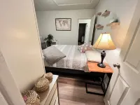 Charming 2 bedroom house 5 miles from Logan Airport/ Boston. Walking to train.