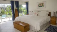 Spacious 4-Bedroom Villa, on a Lovely Waterway, with Beach and Ocean Views