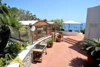 BEAUTIFUL ROMANTIC VILLA SURROUNDED BY GREENERY OVERLOOKING THE SEA
