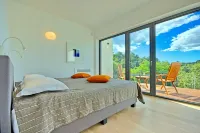 Modern villa with heated pool, whirlpool, volleyball court and mini football