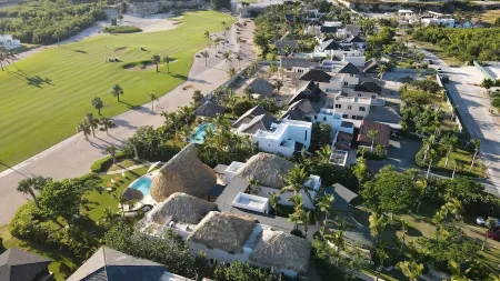 Tropical Golf View Villa. Steps to the ocean with a Gym and Theater-game room.