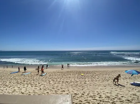 Surf & Stay; Beachfront Condo Steps from Sand - Heated Hot tub -Pool-Pickleball