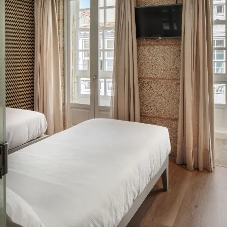 Hotel Atalaia Отели рядом с достопримечательностью «Холм Монте-до-Госо»