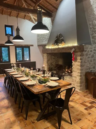 Old mill nestled in greenery in Drôme Provençale, hidden from view