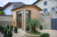 Open space on two floors in detached cottage in ancient medieval courtyard