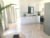 Charming 2-bedroom townhome with WiFi, fitness room in Runaway Bay