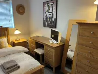 Cosy home in quiet cul-de-sac. Private fenced garden and free parking.