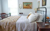 Stay Where History Has a Heartbeat - Mike Wolfe's Two Lanes Guesthouse Hotels in Le Claire