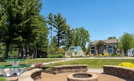 Upscale Lakefront Oasis: Private Dock, Dune Views, Firepit!