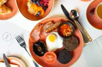 KM Hotel - petit déjeuner