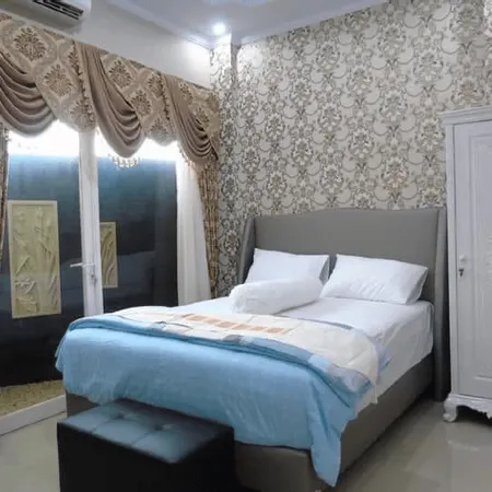 Rumah Tamu Syariah Moulase Center Blimbing
