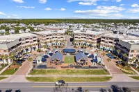 Walk or Bike to Everything! Private Beach Access! Resort Style Pool and Cafe!