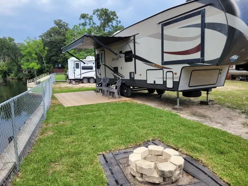 Private Rustic Creekside RV+15 Min Drive to Beach Fenced Parking Lot