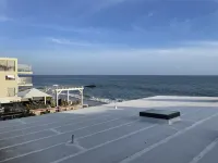 Modern Malibu Road Oceanfront Beach House with AC Hotels in Malibu