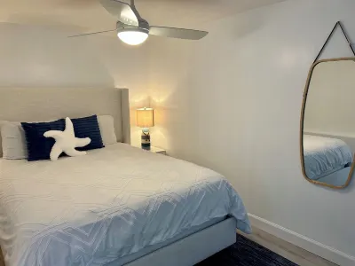 Cozy Coastal Retreat! Fenced Turf Yard • Bikes • Hammock • BBQ • 65” TV