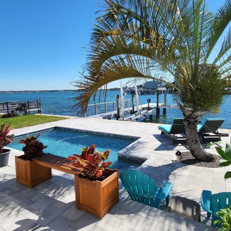 Hidden Gem! Treasure Island Waterfront 2/2 with a pool and dock!