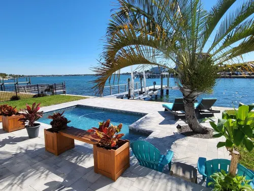Hidden Gem! Treasure Island Waterfront 2/2 with a pool and dock!