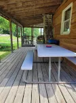 Cozy cottage that sits along canal of Sandy Pond.