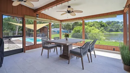 Spectacular home with outdoor POOL and LAKE view (62nd St N)